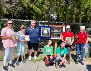 Celebrating the new library box installed at the Horses for Handicapped program in Seminole.