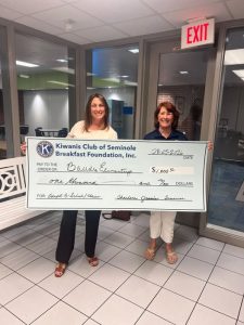 Club Treasurer Charlene presented Bauder Elementary with a $1,000 donation to help support the school and its students.