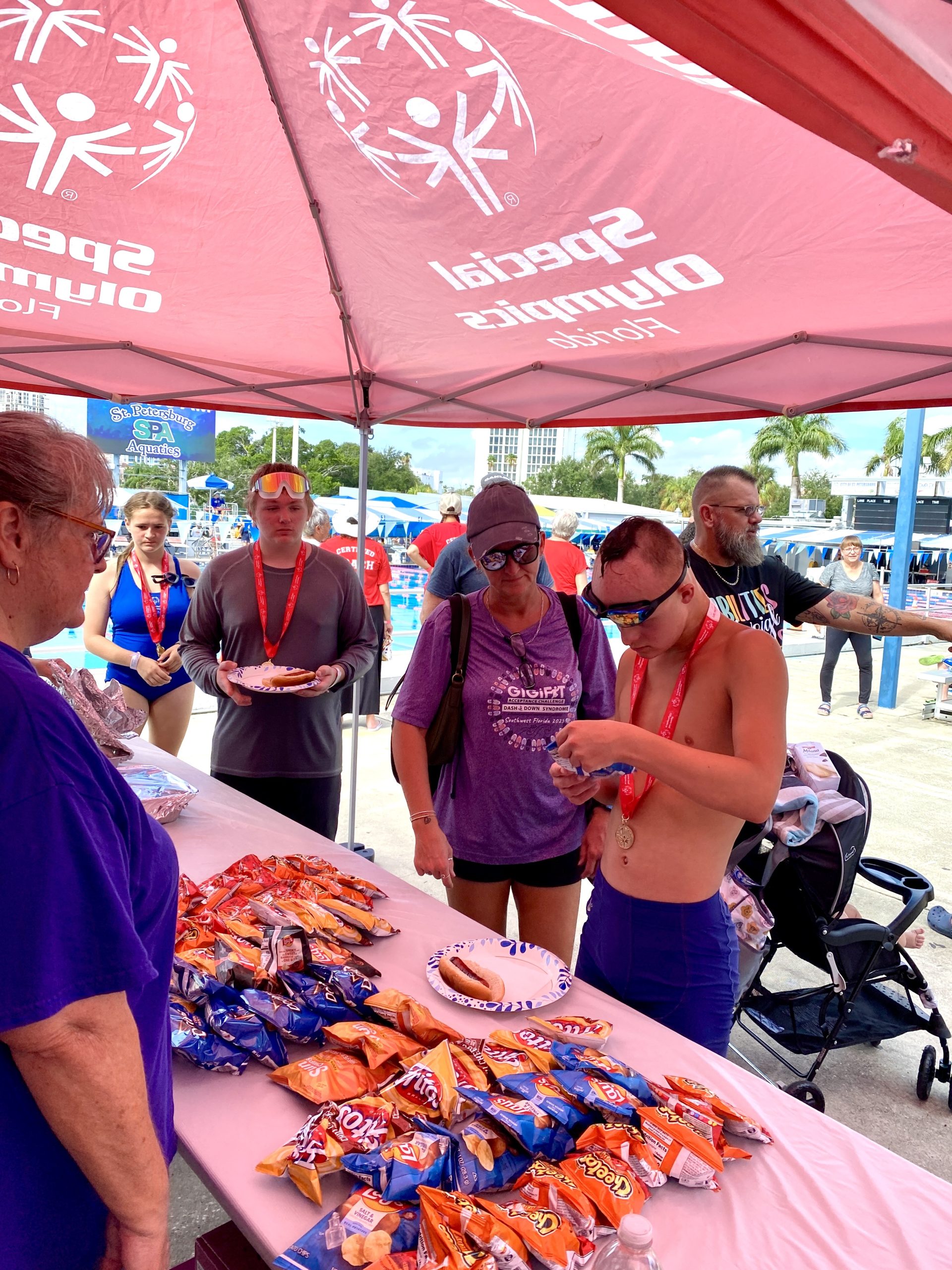 Kiwanis Club of Seminole Breakfast volunteers serve up lunch and smiles to Special Olympics athletes at the 2026 swimming competition in St. Petersburg.
