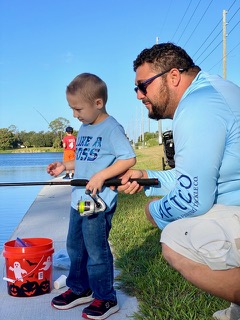 IMG_6334 Sharing smiles and fishing memories with the next generation at Family Fishing Day!