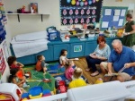 Charlene and Jim read a story to the preschoolers.jpg